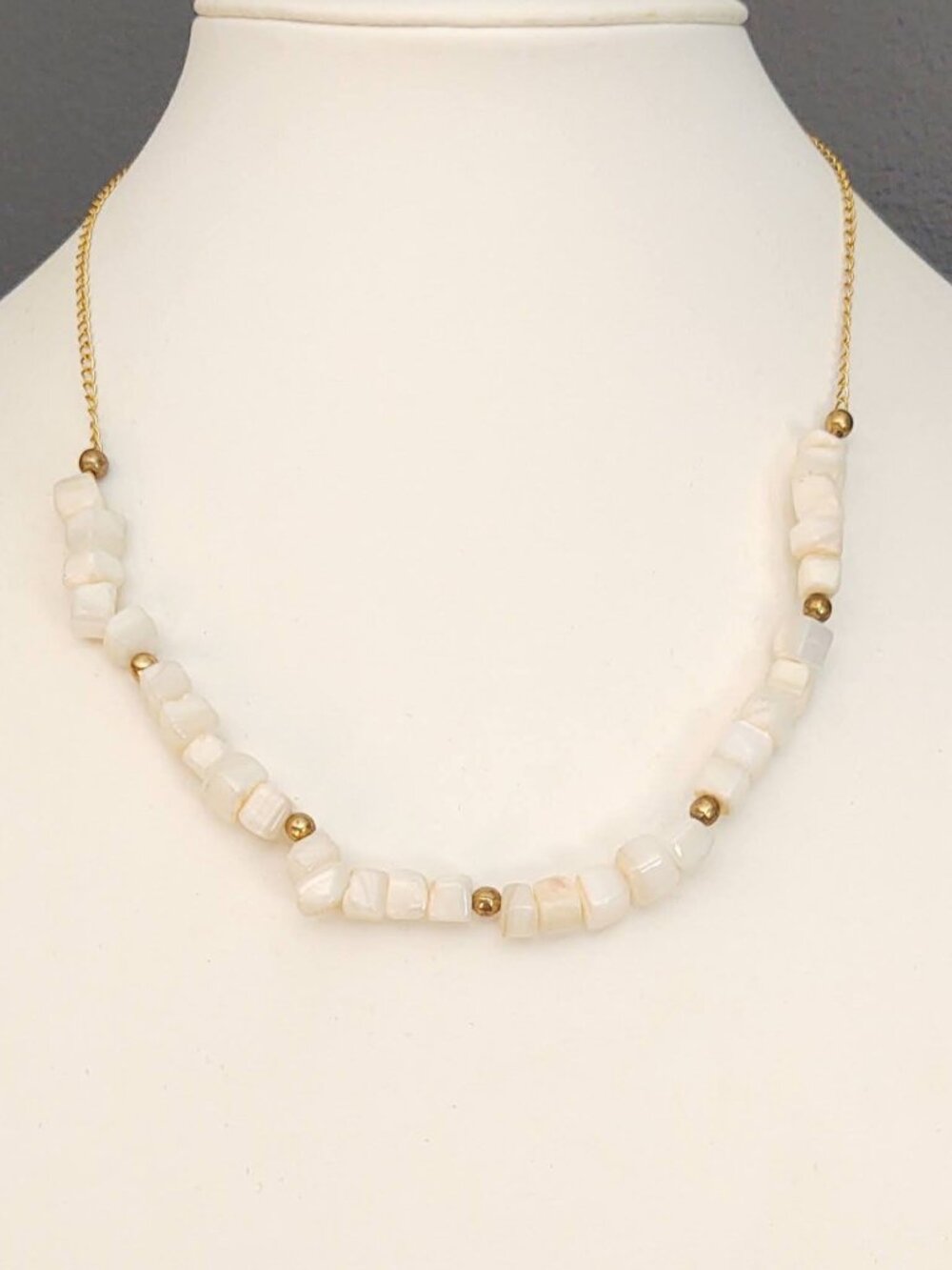Polished white stone w/gold accents necklace